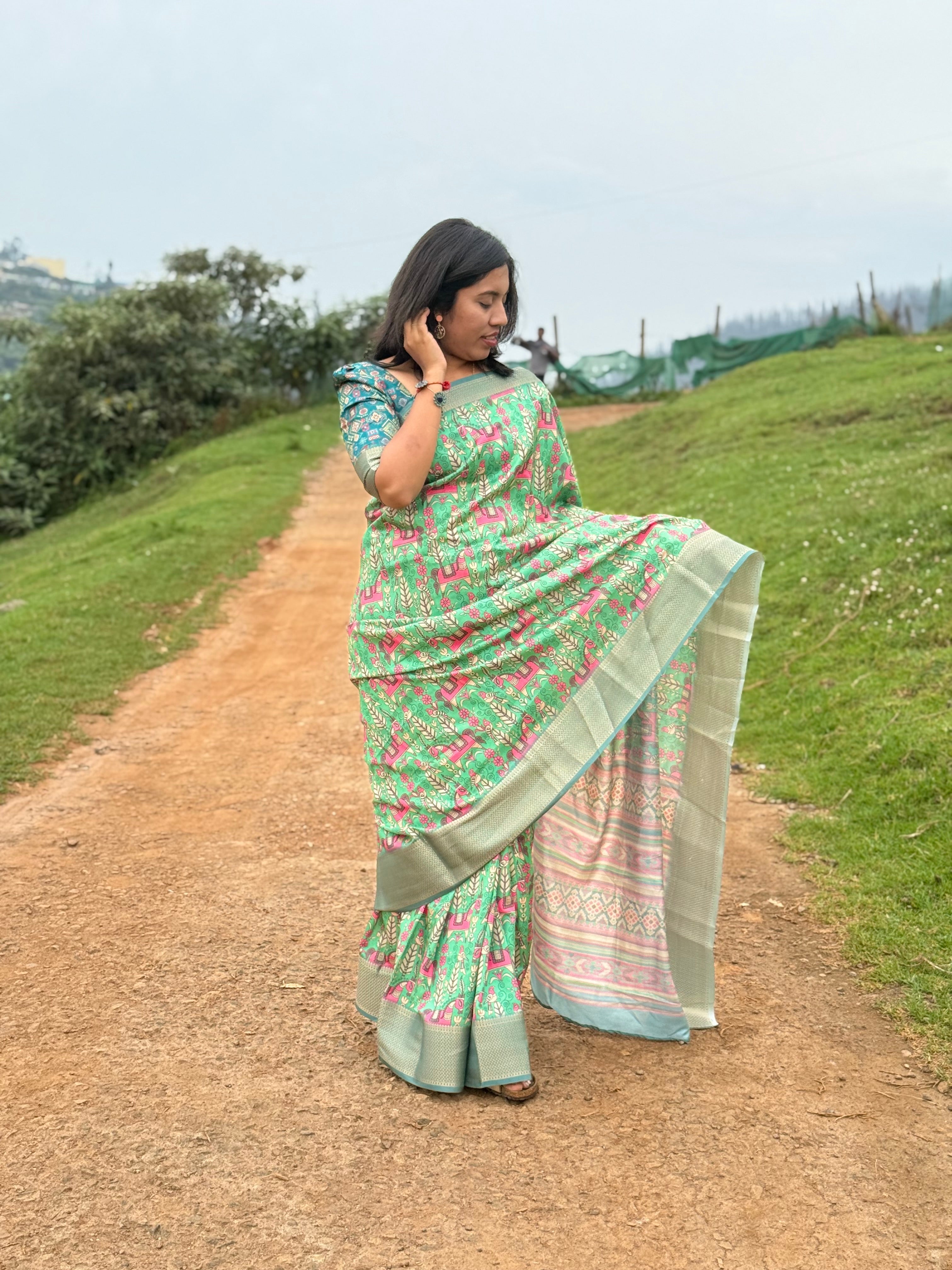 Effortless Elegance: The Timeless Appeal of a Green Saree